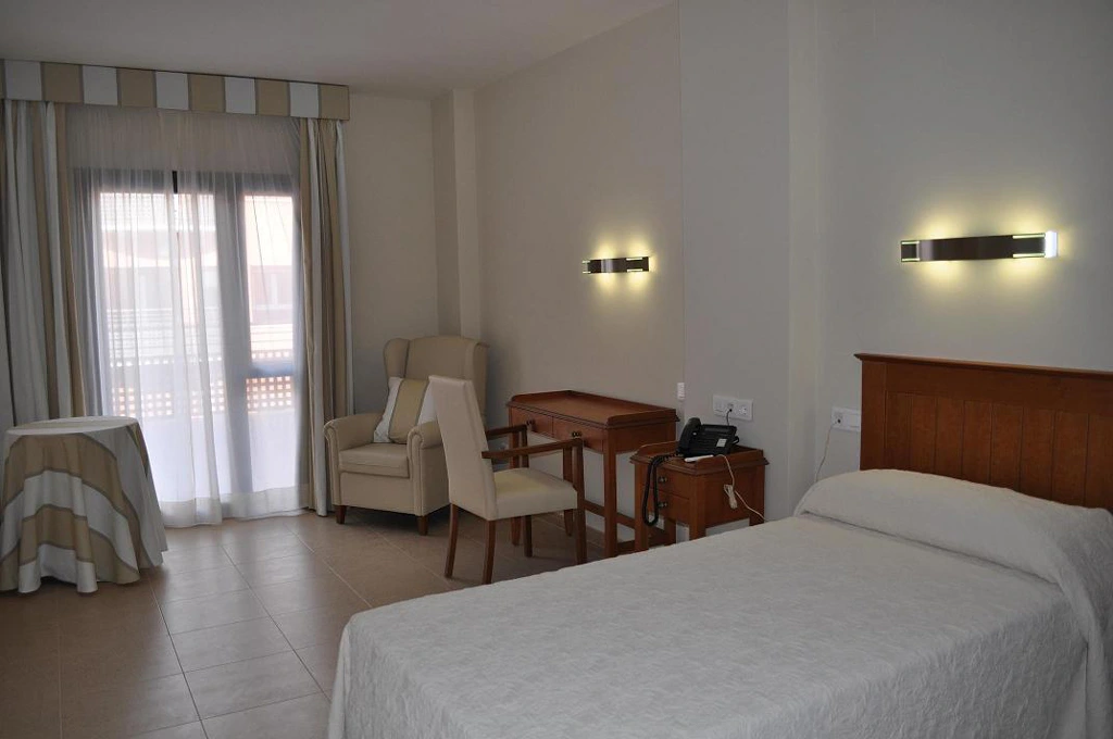 Una de las habitaciones en Caser Residencial Una de las habitaciones en Caser Residencial